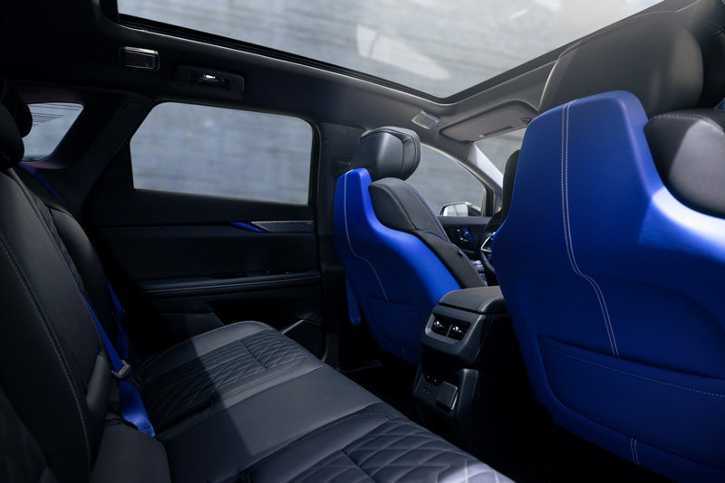Back Seat View of the 2026 OPTIQ-V Blue Front Seats, Sun Roof, and Interior | Rick Bokman Inc. in OLEAN NY